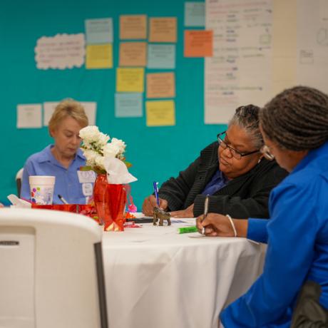 Community members working in a small group