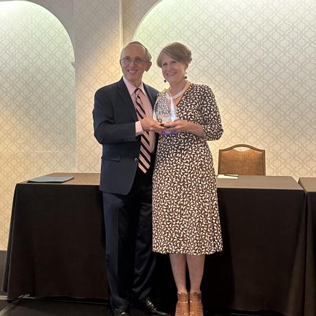 Lisa Davis accepting 2024 Calico Quality Leadership Award